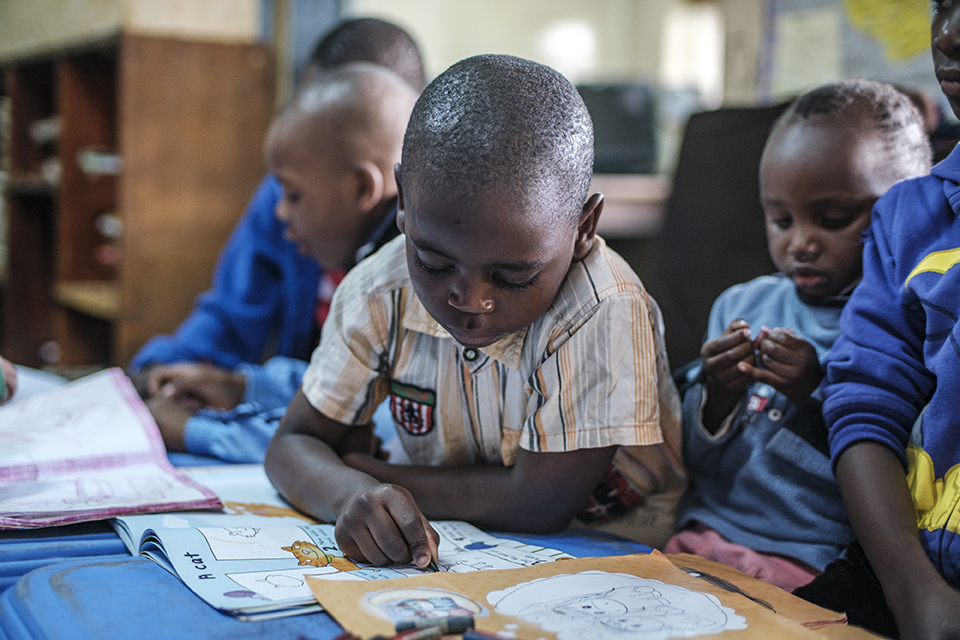 A children writes at the Kibera Pride Children’s Home, in the city of Nairobi, Kenya, on October 27, 2023.