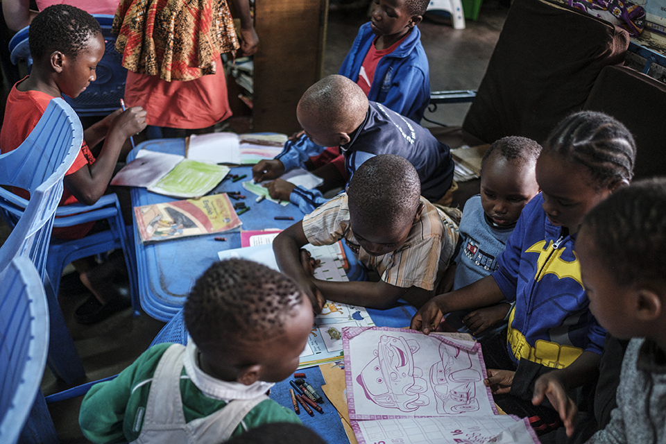 Children read and write during study time at the Kibera Pride Children’s Home, in the city of Nairobi, Kenya, on October 27, 2023.