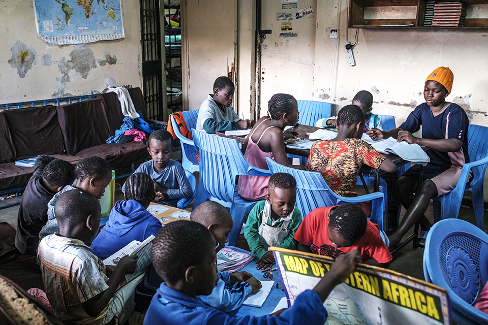 Children read and write during study time at the Kibera Pride Children’s Home, in the city of Nairobi, Kenya, on October 27, 2023.