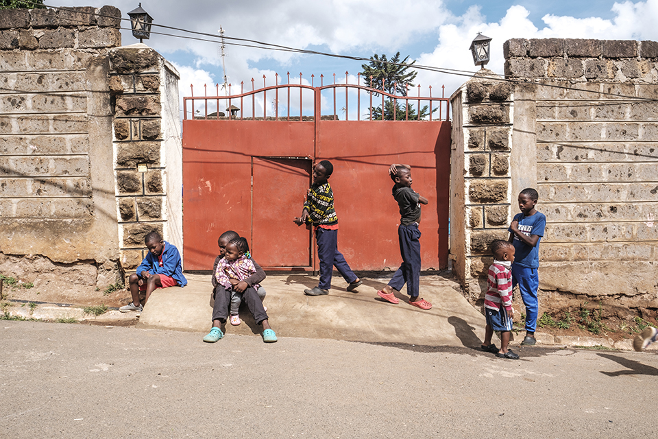 Children play on a street in front of the Kibera Pride Children’s Home, in the city of Nairobi, Kenya, on October 27, 2023.